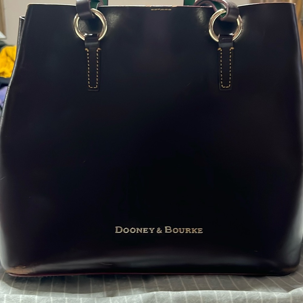 Dooney & Bourke dark brown leather bag.